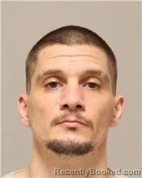 Mugshot of Jeremy Richard Kuhn booked in Anoka County, Minnesota on October 14, 2026