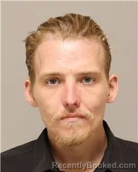 Mugshot of Logan Richard Mitsch booked in Anoka County, Minnesota on October 15, 2026