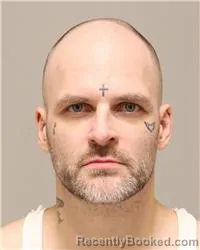 Mugshot of Christopher Kevin Burg booked in Anoka County, Minnesota on October 21, 2026