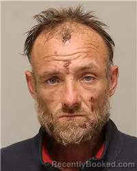 Mugshot of Adam John Morton booked in Anoka County, Minnesota on October 22, 2026