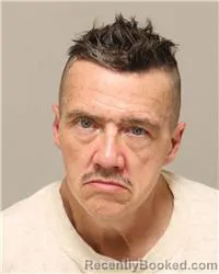 Mugshot of Christopher Michael Earhart booked in Anoka County, Minnesota on October 26, 2026