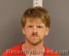 Mugshot of Joshua Douglas Newlun booked in Becker County, Minnesota on August 7, 2026