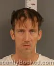 Mugshot of Ryan Leroy Stockman booked in Becker County, Minnesota on August 15, 2026