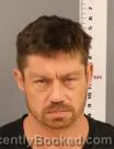 Mugshot of Travis Joel Newman booked in Becker County, Minnesota on September 12, 2026