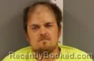 Mugshot of Kyle Robert Schlicht booked in Becker County, Minnesota on October 6, 2026