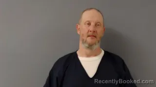 Mugshot of JOHN ALQUIN MUELLNER booked in Benton County, Minnesota on April 26, 2026