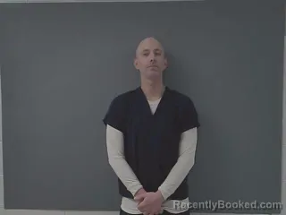 Mugshot of TRAVIS JOHN FOUQUETTE