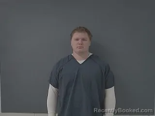 Mugshot of RILEY JAMES THOM booked in Benton County, Minnesota on March 27, 2026