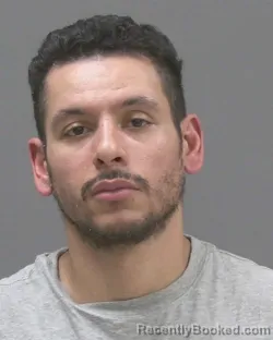 Mugshot of Shane Cai Delacruz booked in Blue Earth County, Minnesota on October 9, 2026