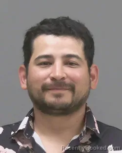 Mugshot of Oscar Patino Gonzalez booked in Blue Earth County, Minnesota on October 11, 2026
