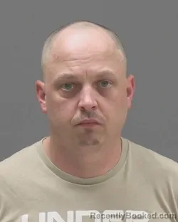 Mugshot of Adam Mathew Monson booked in Blue Earth County, Minnesota on July 28, 2026