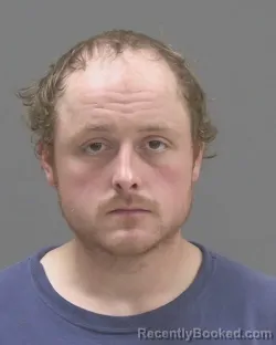 Mugshot of Mathew James Perry Mcguire booked in Blue Earth County, Minnesota on August 14, 2026