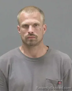 Mugshot of Jordan James Kenady Rollings booked in Blue Earth County, Minnesota on August 15, 2026