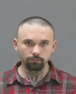 Mugshot of Dominic Christopher Schmidt booked in Blue Earth County, Minnesota on July 26, 2026
