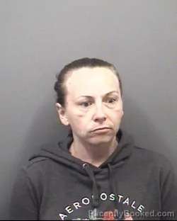 Mugshot of AMBER SHALEE BARNETT booked in Rowan County, North Carolina on May 18, 2026