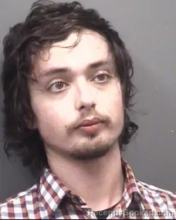 Mugshot of AARON THOMAS ELIZALDE booked in Rowan County, North Carolina on April 28, 2026