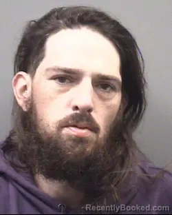 Mugshot of Christopher Neil Coughenour booked in Rowan County, North Carolina on October 1, 2026