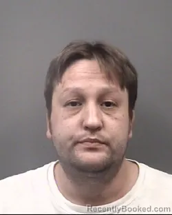 Mugshot of CHRISTOPHER WILLIAM EZZELL booked in Rowan County, North Carolina on April 7, 2026