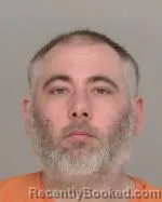 Mugshot of Christopher Charles Clinton Ames booked in Crow Wing County, Minnesota on March 10, 2026