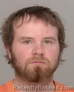 Mugshot of Michael Charles Schluttner booked in Crow Wing County, Minnesota on March 26, 2026