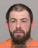 Mugshot of Justin Cole Surratt booked in Crow Wing County, Minnesota on March 27, 2026