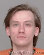 Mugshot of Dustin Robert Hansen booked in Crow Wing County, Minnesota on April 9, 2026