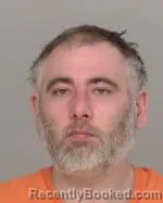 Mugshot of Christopher Charles Clinton Ames booked in Crow Wing County, Minnesota on April 12, 2026