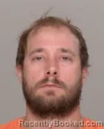 Mugshot of Dustin Nicholas Schemmel booked in Crow Wing County, Minnesota on June 23, 2026