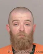 Mugshot of Dustin Ray Carner booked in Crow Wing County, Minnesota on October 4, 2026