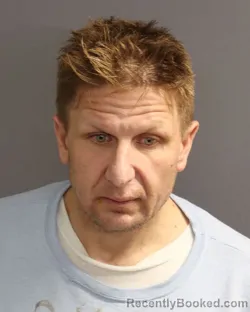 Mugshot of NATHAN JAMES BREZNIAK booked in Dakota County, Minnesota on March 6, 2026