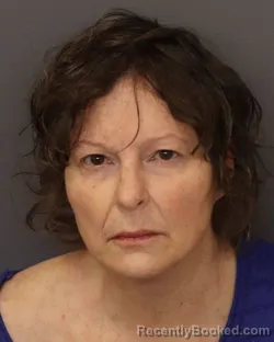 Mugshot of KAREN KAY POWELL booked in Dakota County, Minnesota on March 18, 2026