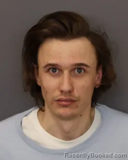 Mugshot of JUSTIN ALLEN ACKERMAN booked in Dakota County, Minnesota on March 18, 2026