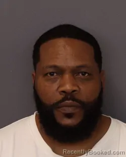 Mugshot of SR DENNIS booked in Dakota County, Minnesota on March 21, 2026