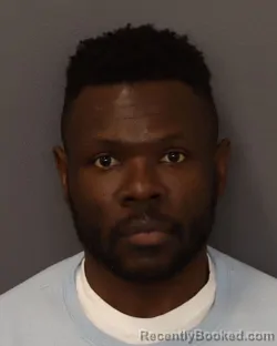 Mugshot of YONA ALBERT ABALIWANO booked in Dakota County, Minnesota on March 23, 2026