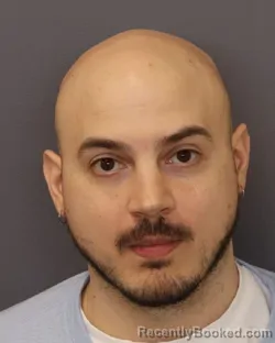 Mugshot of JOHN RUSSEL KAVITZ booked in Dakota County, Minnesota on March 25, 2026