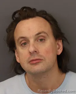 Mugshot of CHRISTOPHER CARL REMLEY booked in Dakota County, Minnesota on March 25, 2026