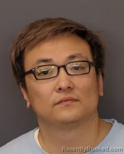 Mugshot of ZIHAO XU booked in Dakota County, Minnesota on March 25, 2026