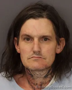 Mugshot of NICHOLAS ARTHUR TRUNNELL booked in Dakota County, Minnesota on March 26, 2026