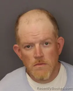 Mugshot of JOEL KARL BELFORD booked in Dakota County, Minnesota on March 27, 2026