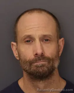 Mugshot of DEVIN JAY DUGGER booked in Dakota County, Minnesota on March 28, 2026