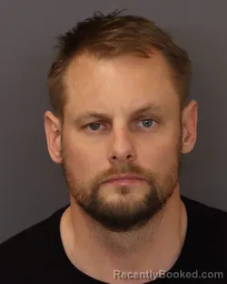 Mugshot of MATTHEW GENE LOTT booked in Dakota County, Minnesota on March 29, 2026