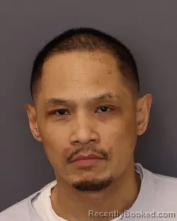 Mugshot of PHOMMALA BOUNKHONG booked in Dakota County, Minnesota on March 30, 2026