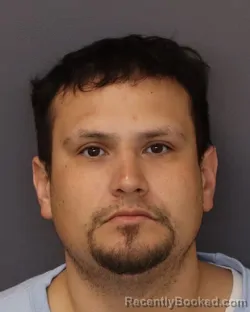 Mugshot of MARTIN XIQUE MUNOZ booked in Dakota County, Minnesota on March 31, 2026