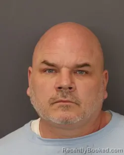 Mugshot of TROY ALAN POINDEXTER booked in Dakota County, Minnesota on April 1, 2026