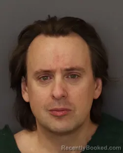 Mugshot of CHRISTOPHER CARL REMLEY booked in Dakota County, Minnesota on April 1, 2026