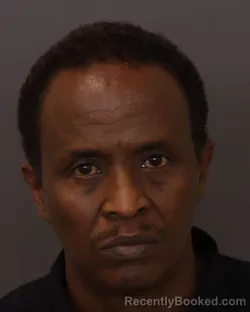 Mugshot of Hussein Mohamed Hussein booked in Dakota County, Minnesota on June 11, 2026