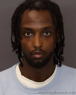 Mugshot of Ahmed Abdi Ibrahim booked in Dakota County, Minnesota on July 9, 2026