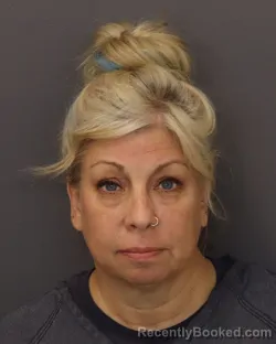 Mugshot of Irene Marie Lutjen booked in Dakota County, Minnesota on July 15, 2026
