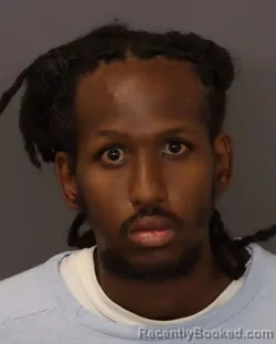 Mugshot of Mohamed Asad Abdi booked in Dakota County, Minnesota on July 22, 2026