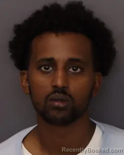 Mugshot of Abdirahman Abdiaziz Hassan booked in Dakota County, Minnesota on July 23, 2026